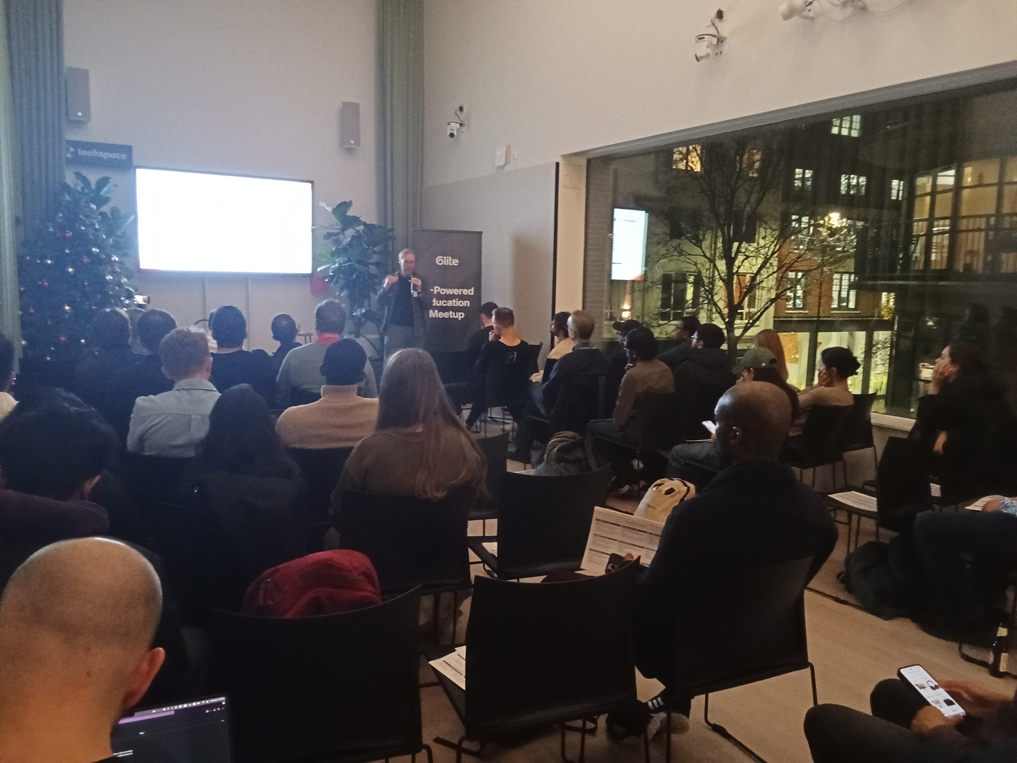 Attendees listening to a presentation at Techspace Goswell Road during the December AI-Powered Education meetup.